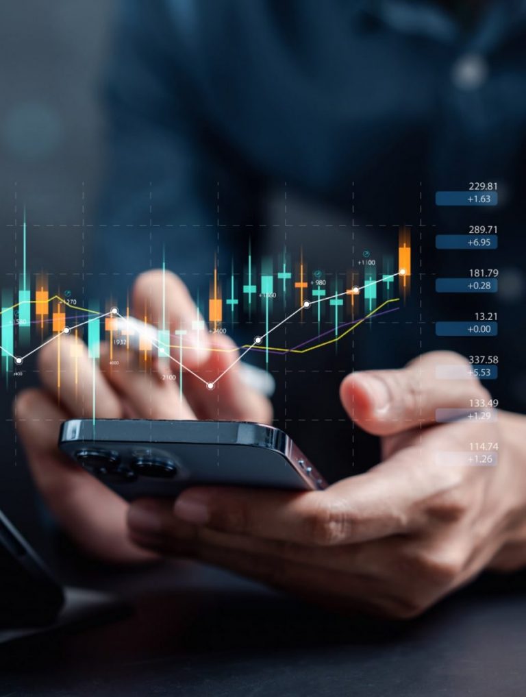 investor analysis with stock exchange graph on screen